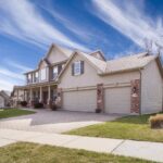 Suburban house with garage and driveway.