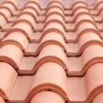 Red clay roof tiles in rows.