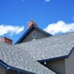 House roof with blue sky background.