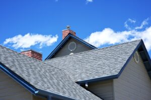 House roof with blue sky background.