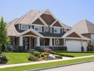 Large suburban house with landscaped yard.