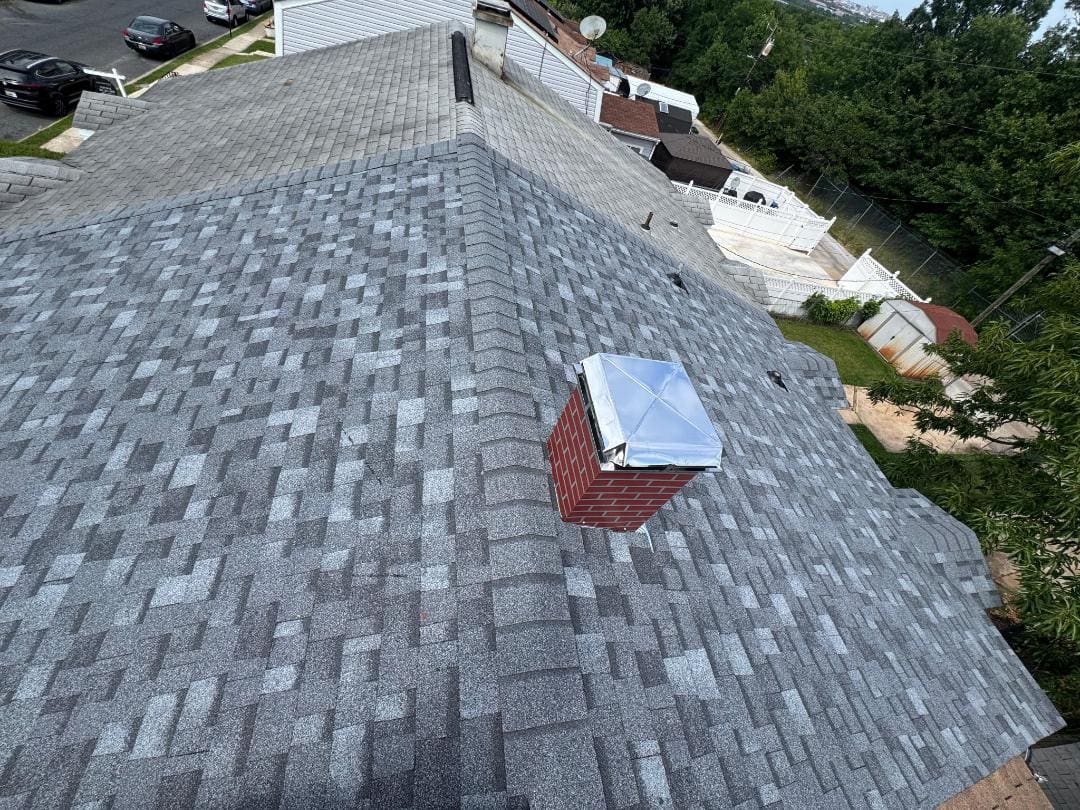 Ray McLemore inspecting a residential roofing project for a Maryland homeowner.