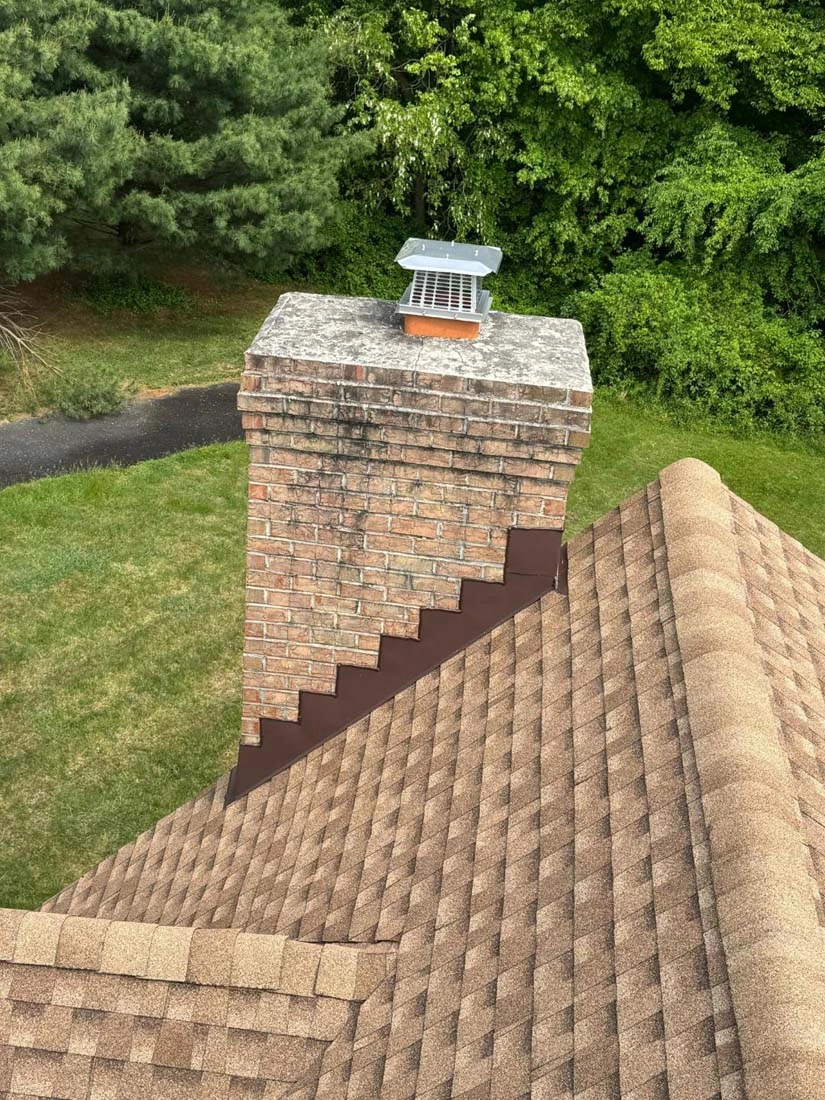 Completed asphalt shingle roof installed by Ray’s in Maryland