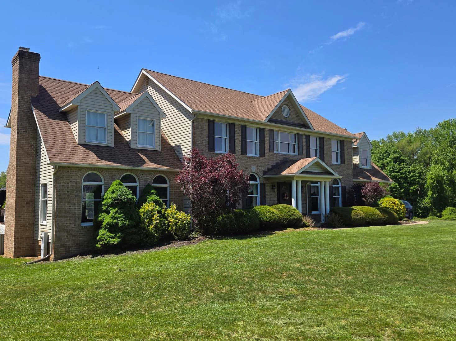 Raymond McLemore of Ray’s Harford Home Improvement Contractors at a completed Maryland roofing project