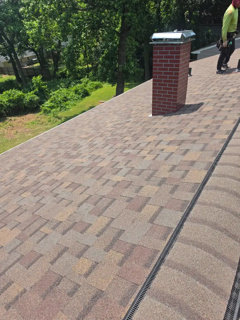 Chimney and surrounding shingle roofing on a Maryland home