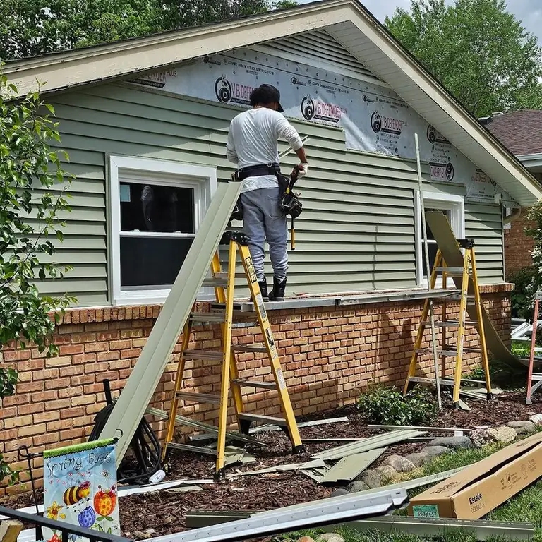 Ray’s siding installation in progress on a residential home.